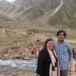 Photograph of Sana (Pashtun) and me, Naomi (white) in the mountains in Pakistan, smiling together